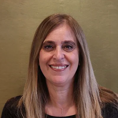 A headshot photo of Kathy