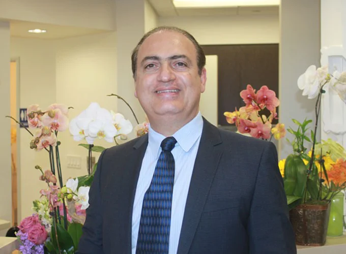 Dr. Shahin Issac Bina in a suit and tie