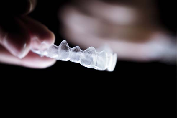 Comparing The Invisalign Process With Traditional Braces